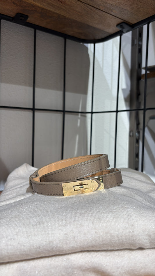 Verstelbare riem taupe